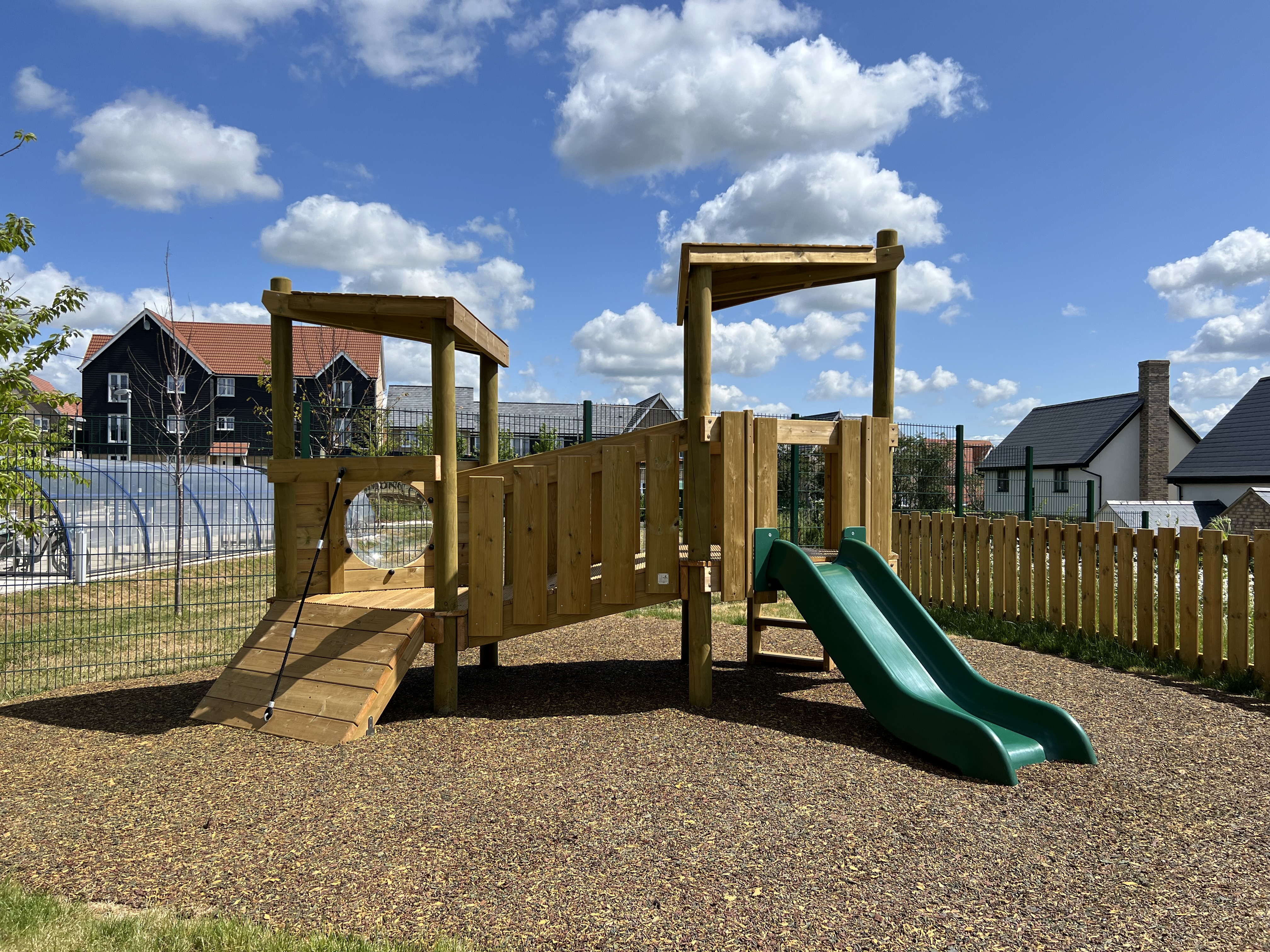 A play area with a slide for Avanti Meadows