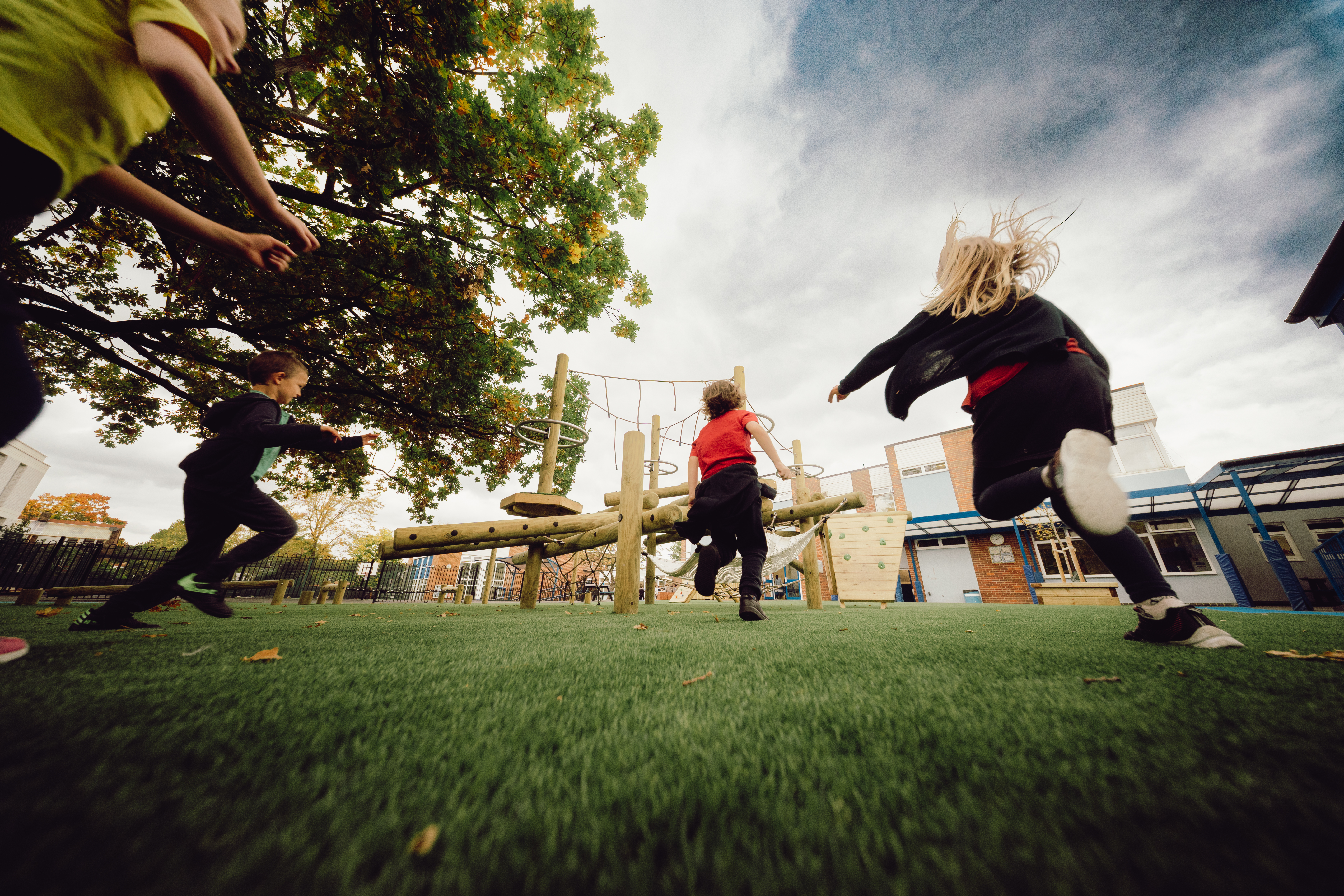 Children running to climber