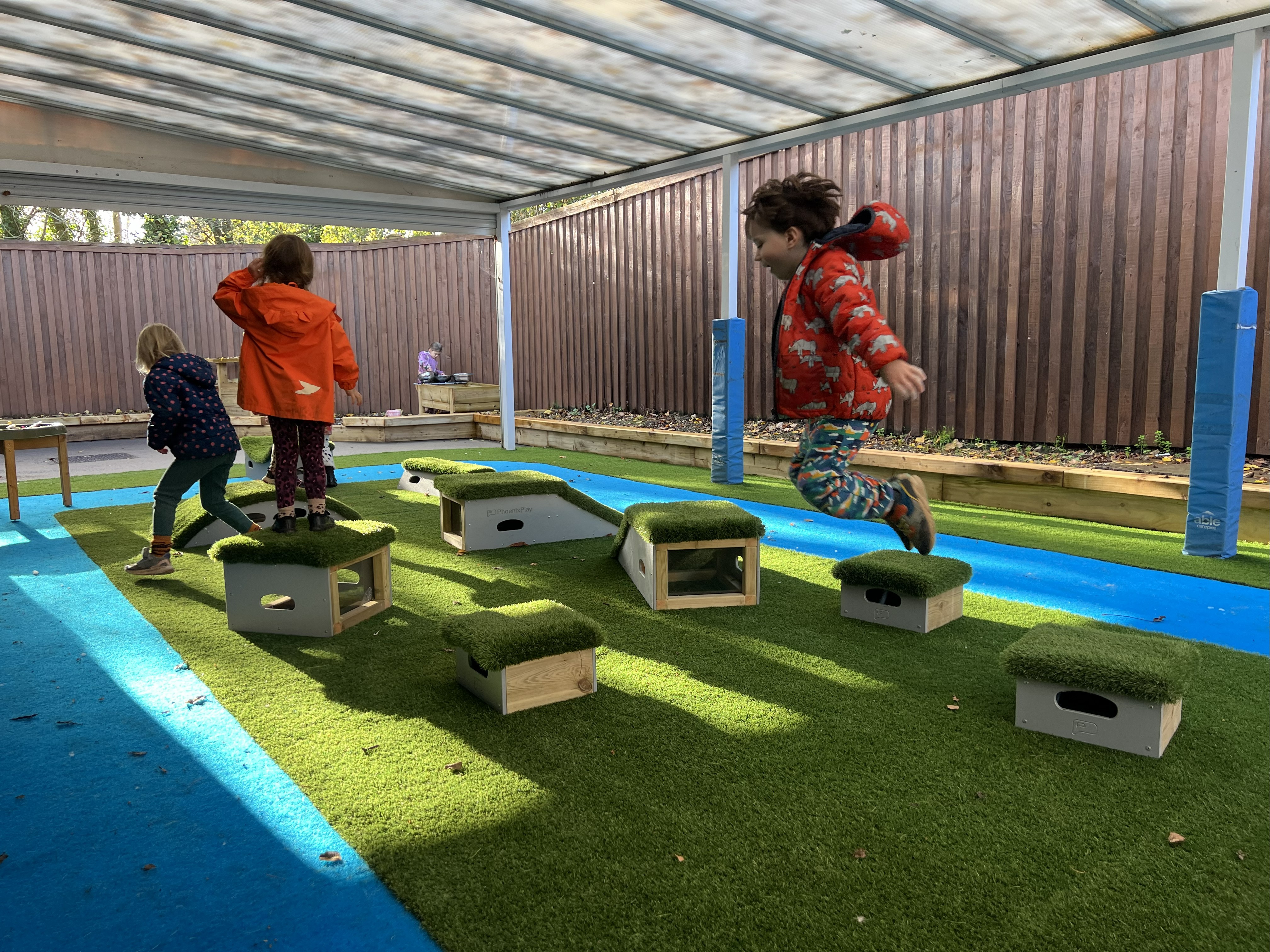 Child jumping on Great Explorer blocks