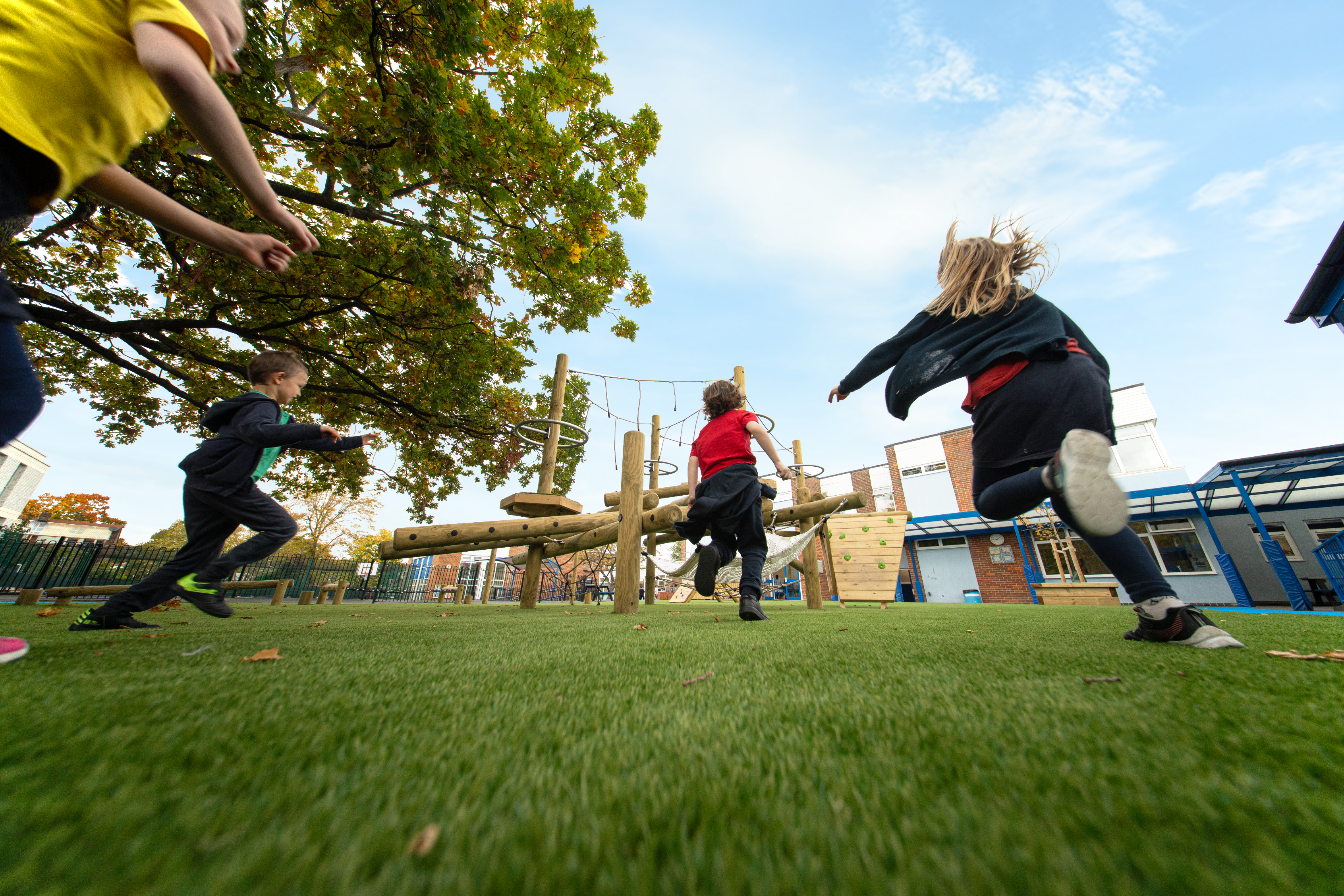 Children running to climber